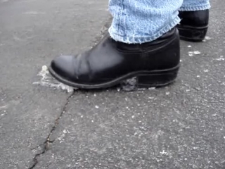 male black boot stuck in glue